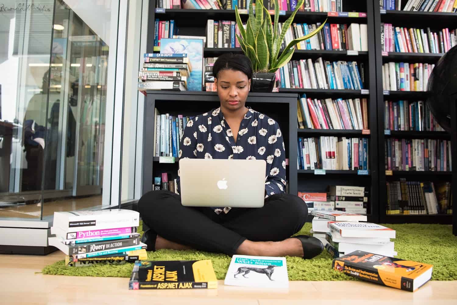 a woman working on her laptop