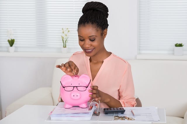 Woman saving money fast on a low income