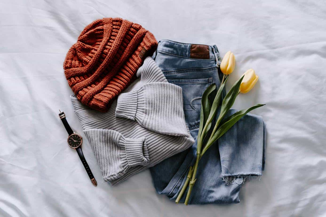 flat lay of used clothing to sell
