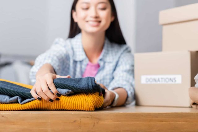 girl with box of free stuff