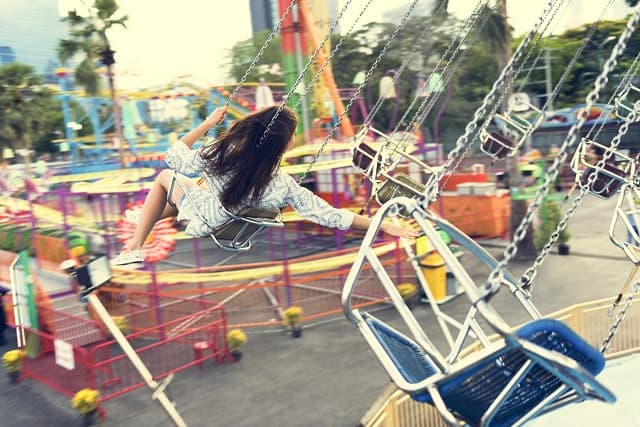 Woman testing ride at a theme park