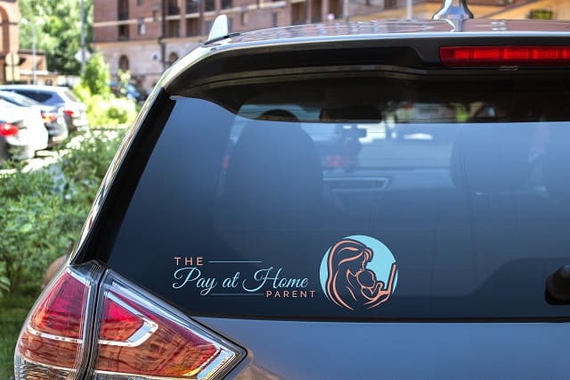 The Pay at Home Parent logo on car window