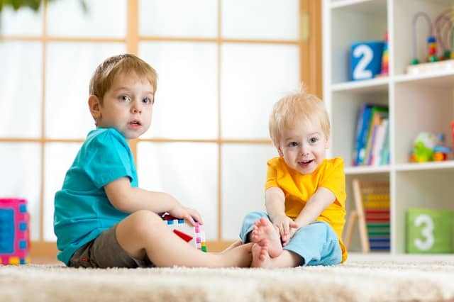 Two boys playing in an at home daycare