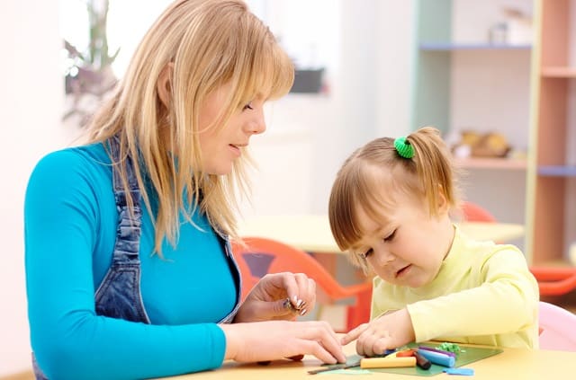 Woman babysitting girl