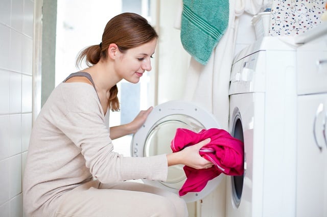Woman getting paid to do laundry