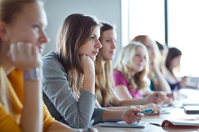 Woman getting paid to go to school