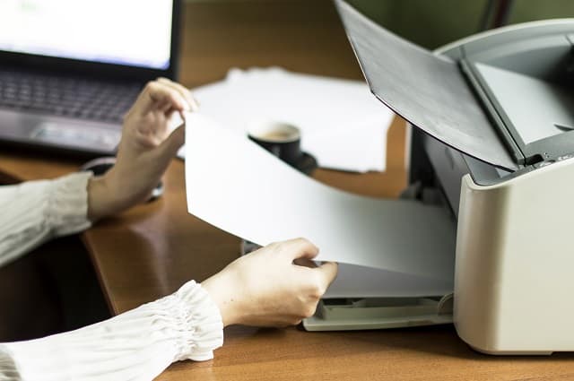 woman getting paid to print coupons