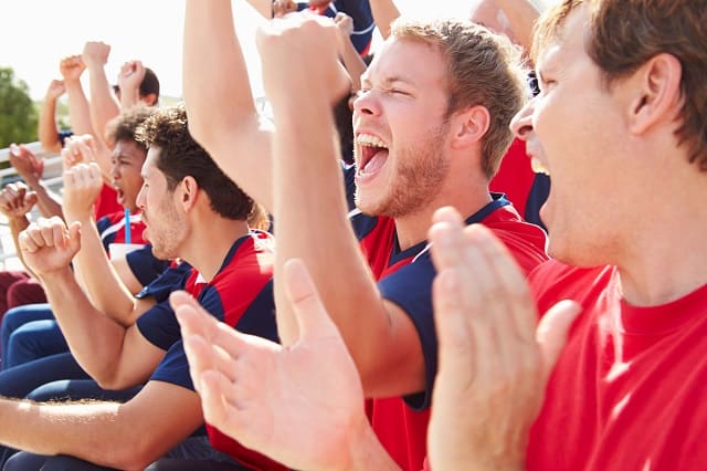 Group of guys getting paid to watch sports