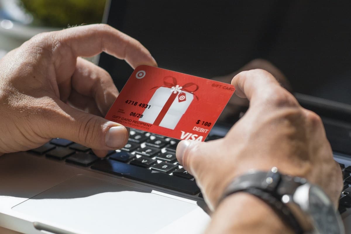 Man holding Target gift card