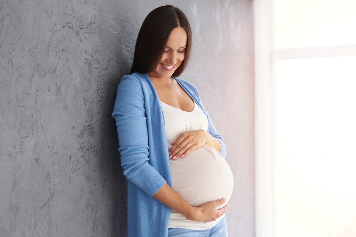 Portrait of a pregnant surrogate mother