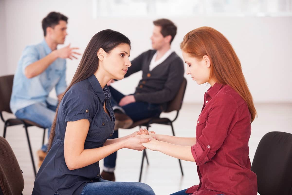 Professional woman getting paid to help another woman