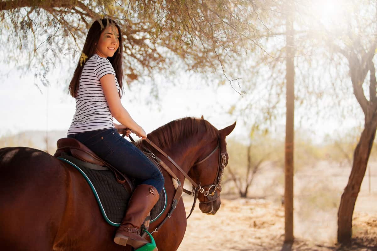 Woman getting paid to ride her horse