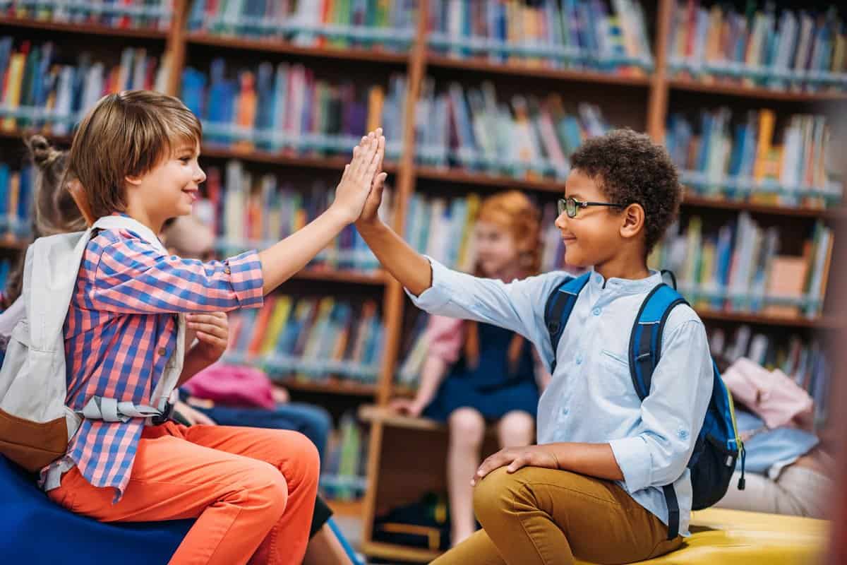 Students high fiving