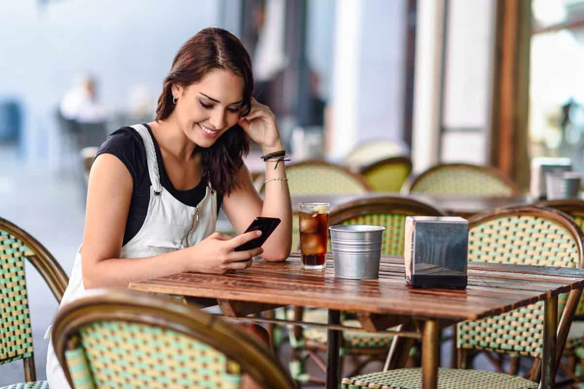 Woman searching the web on her smartphone