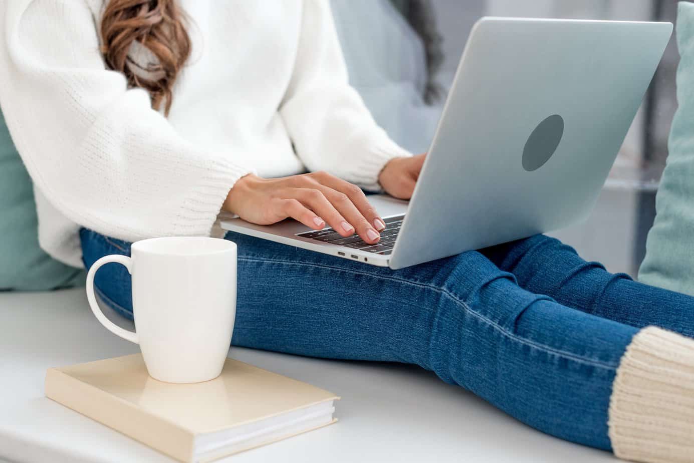 Woman working on a laptop Saturday morning