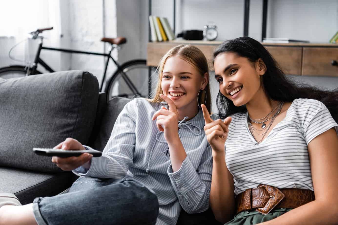 two women watching Netflix